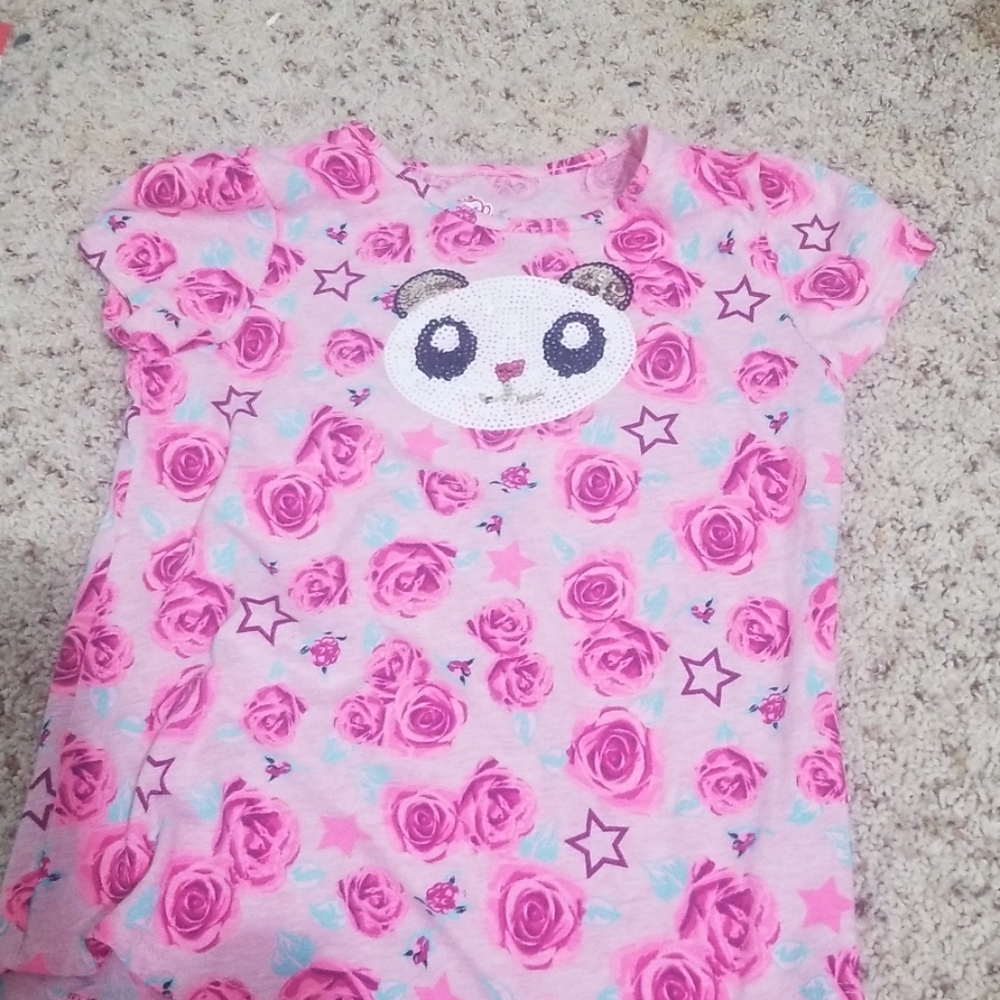 A kids shirt with multiple designs